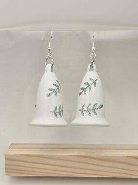 White Bell Dangle Earrings with Green Leaf Motif